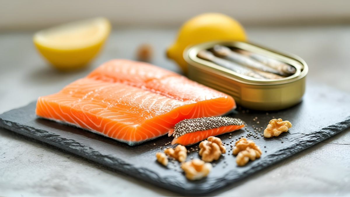 Salmon, sardines, walnuts and chia seeds on slate, sources of EPA and DHA omega-3