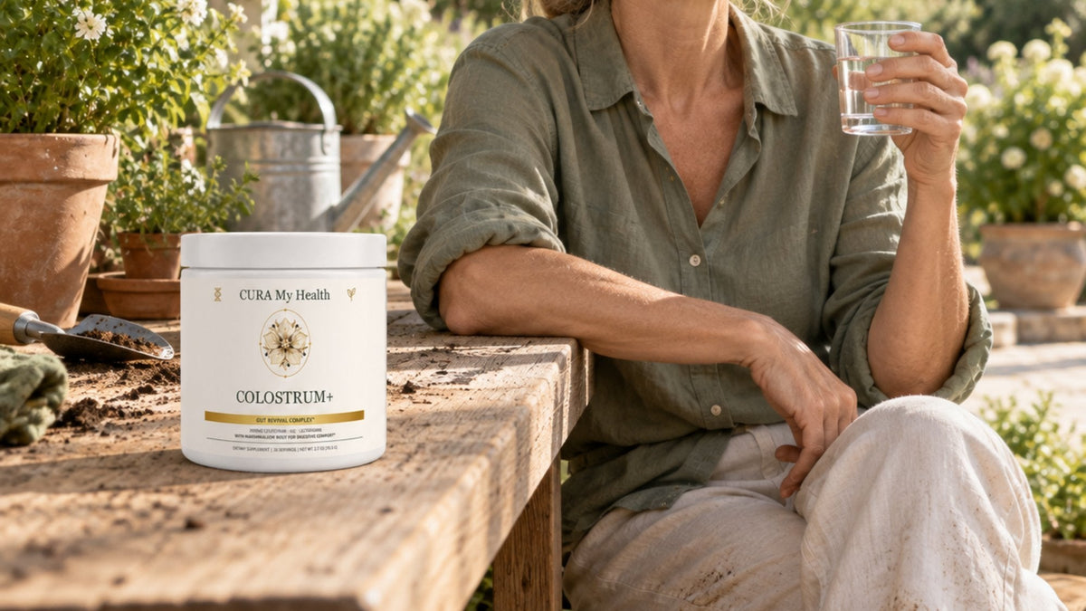 Colostrum+ tub on a garden bench beside a person holding a glass of water