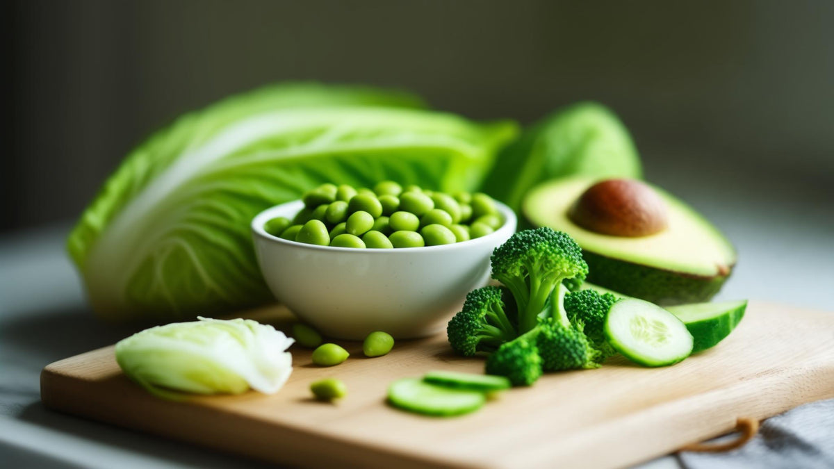 Edamame, avocado, broccoli, cucumber and cabbage on a light board, foods that contain NMN