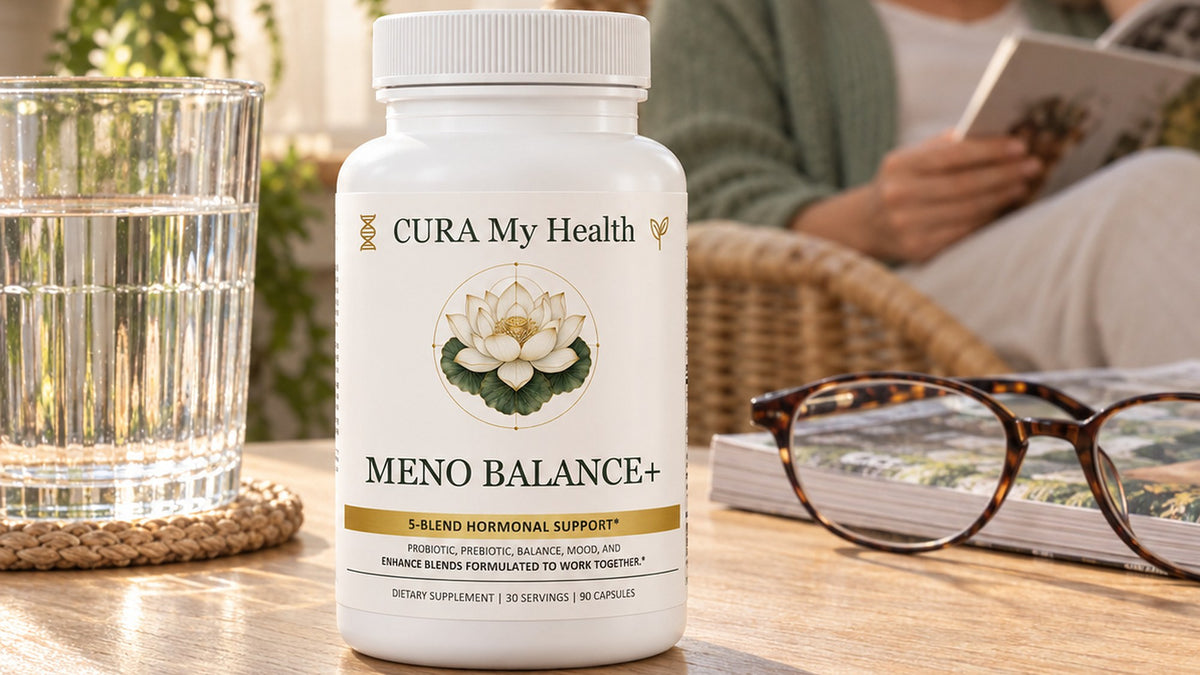 Meno Balance+ bottle on a wooden table beside a glass of water and reading glasses while a person reads behind it