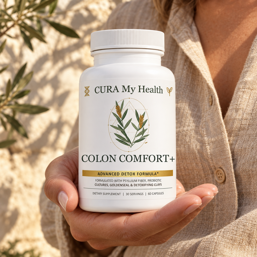 Colon Comfort+ bottle held in one hand outdoors beside olive leaves